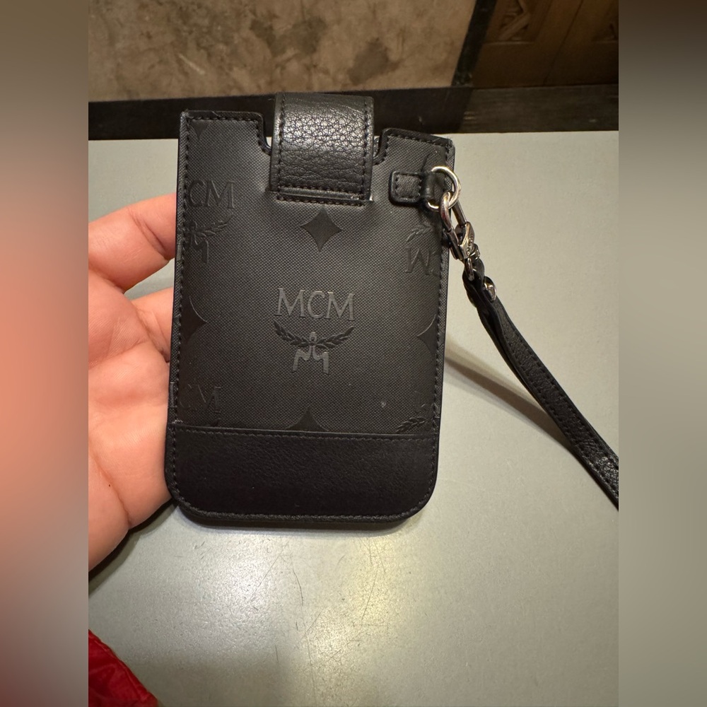MCM studded iPhone pouch